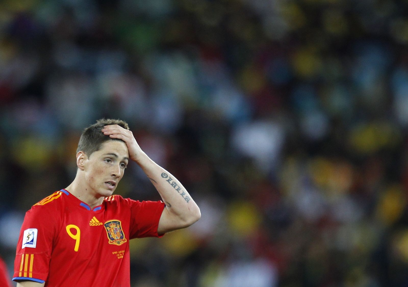 Spain's Fernando Torres reacts during a 2010 World Cup Group H match against Switzerland at Moses Mabhida stadium in Durban