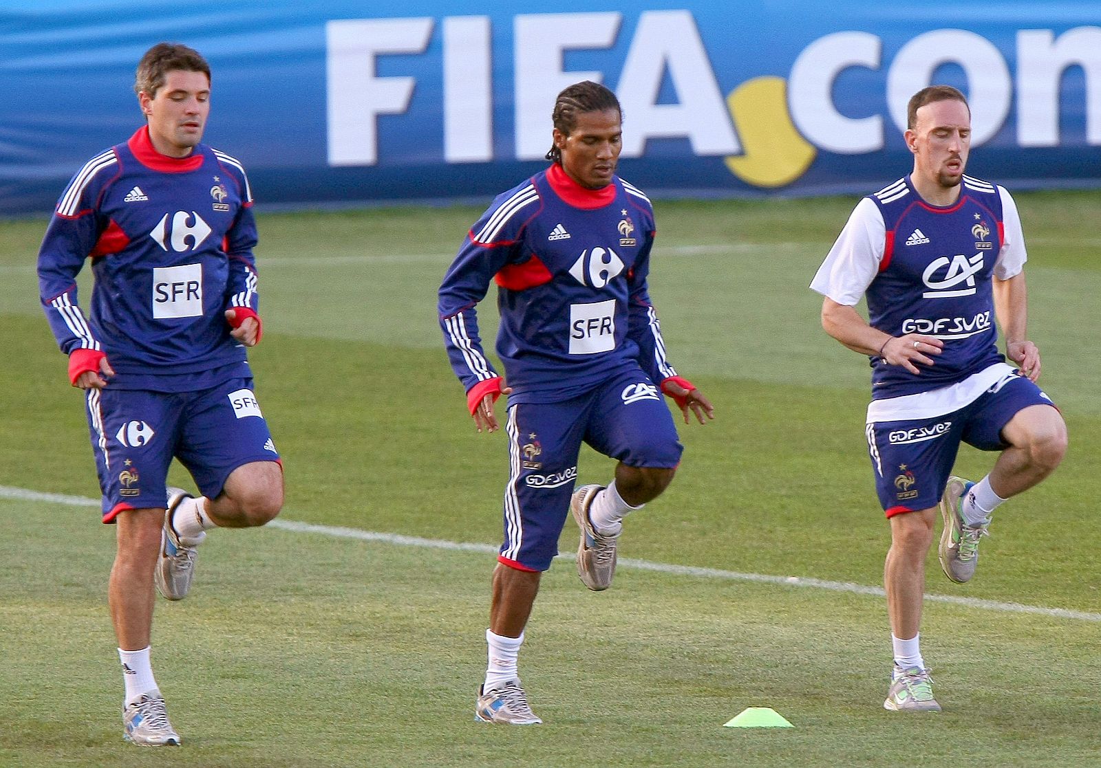 Ribéry, en un entrenamiento con Florent Malouda.