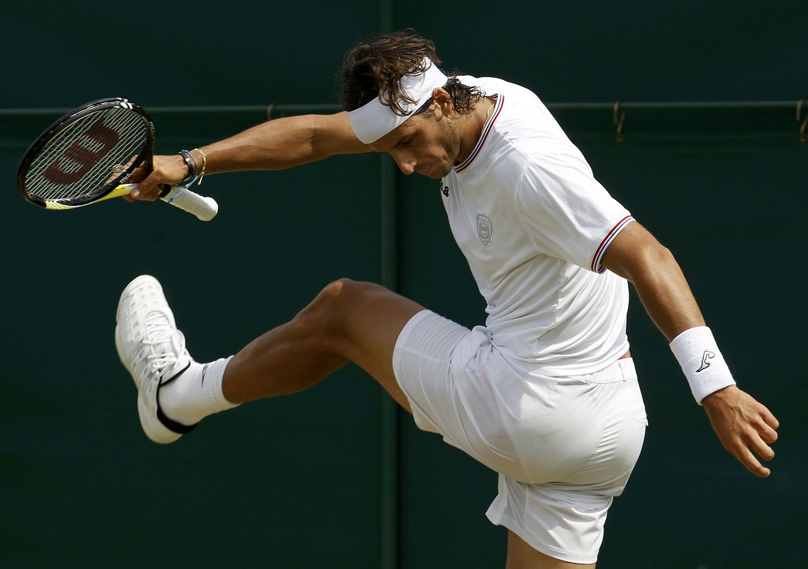 Feliciano López patea una bola en su partido ante el lituano Berankis.