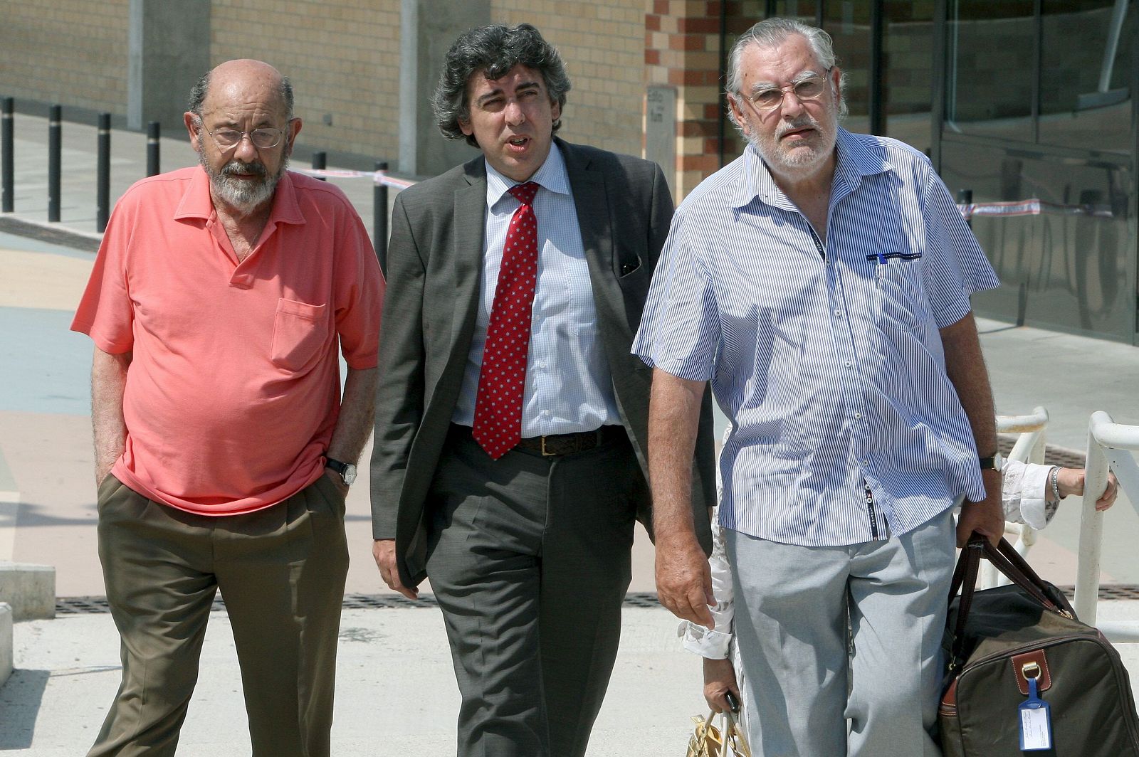 Fèlix Millet (i), Jordi Montull (d), y el abogado Jordi Pina (c) en una imagen de archivo.