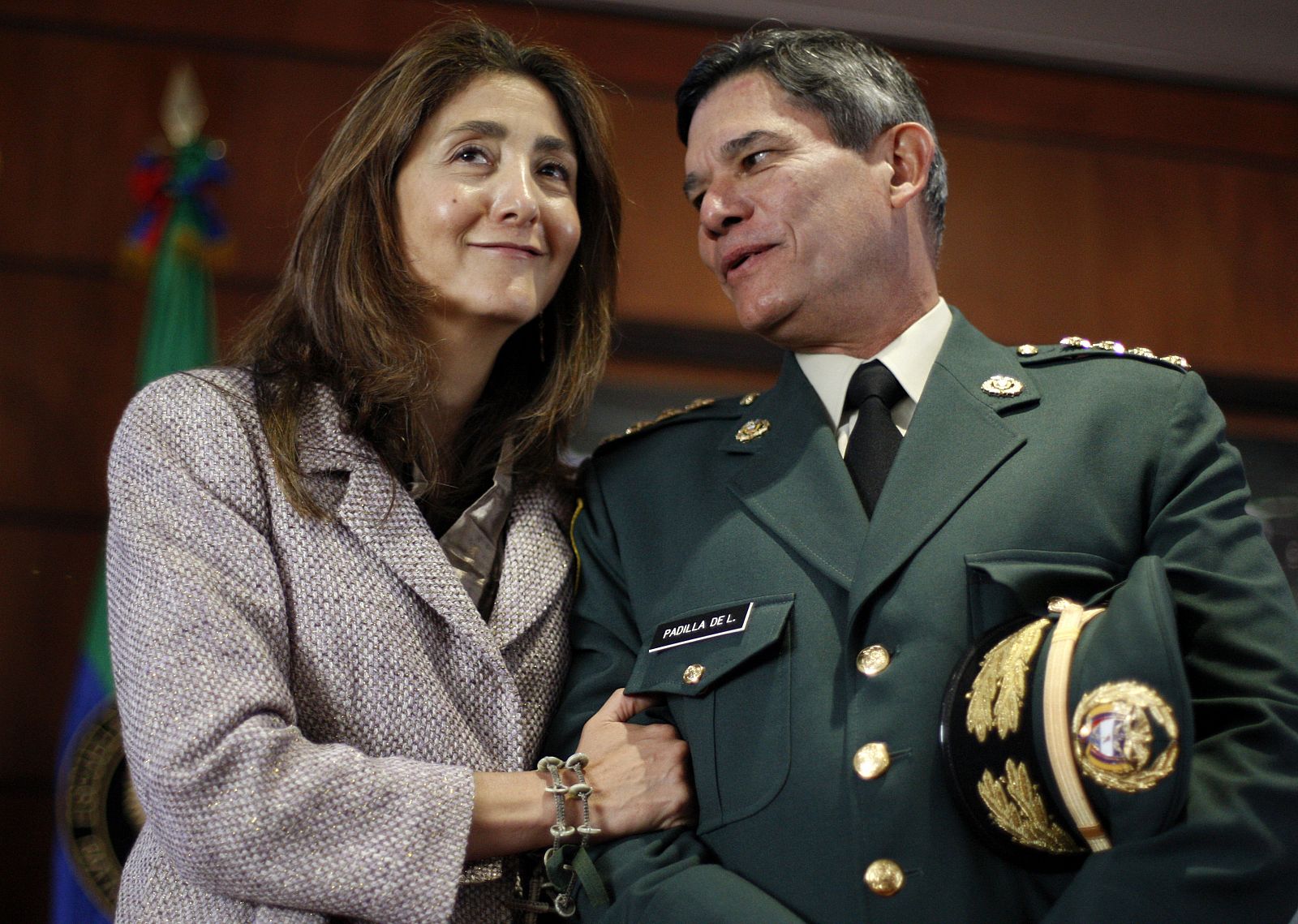 Former FARC hostage, French-Colombian Betancourt, talks with Commander of the Armed Forces General Padilla after a ceremony for the two-year anniversary of "Operation Jaque", at a military school in Bogota