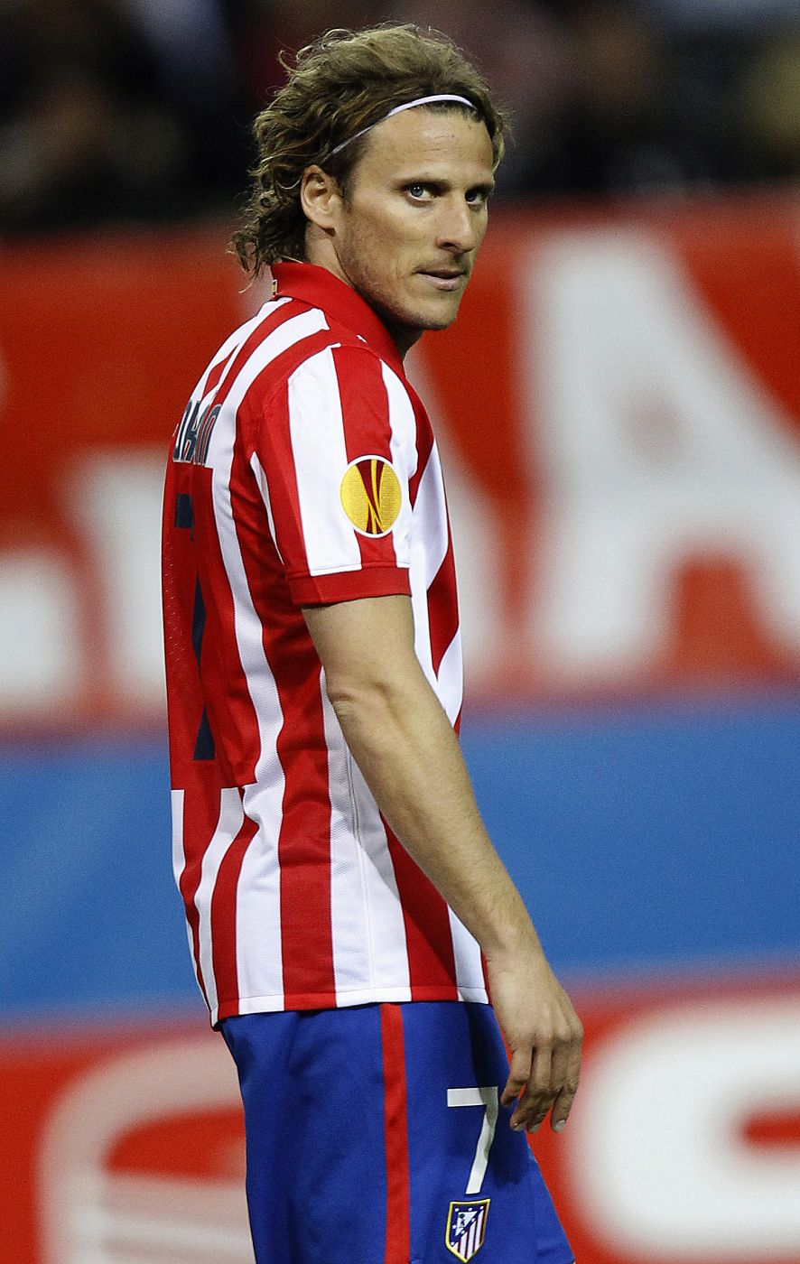 Atletico Madrid's Forlan looks on after missing a scoring opportunity against Valencia during their Europa League quarter-final, second leg soccer match at the Vicente Calderon stadium in Madrid