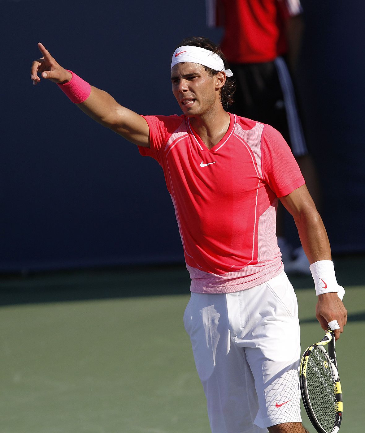 Nadal questions a call during his match against Benneteau at the Cincinnati Masters tennis tournament