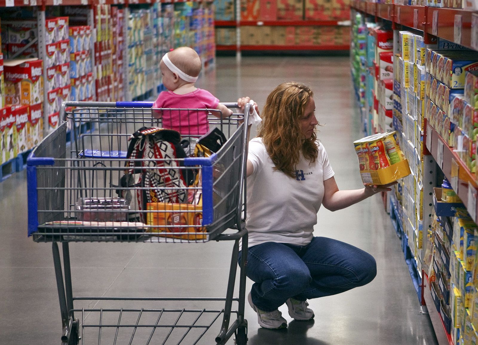 A customer shops in the expanded baby department at a remodelled Sam's Club in Rogers, Arkansas
