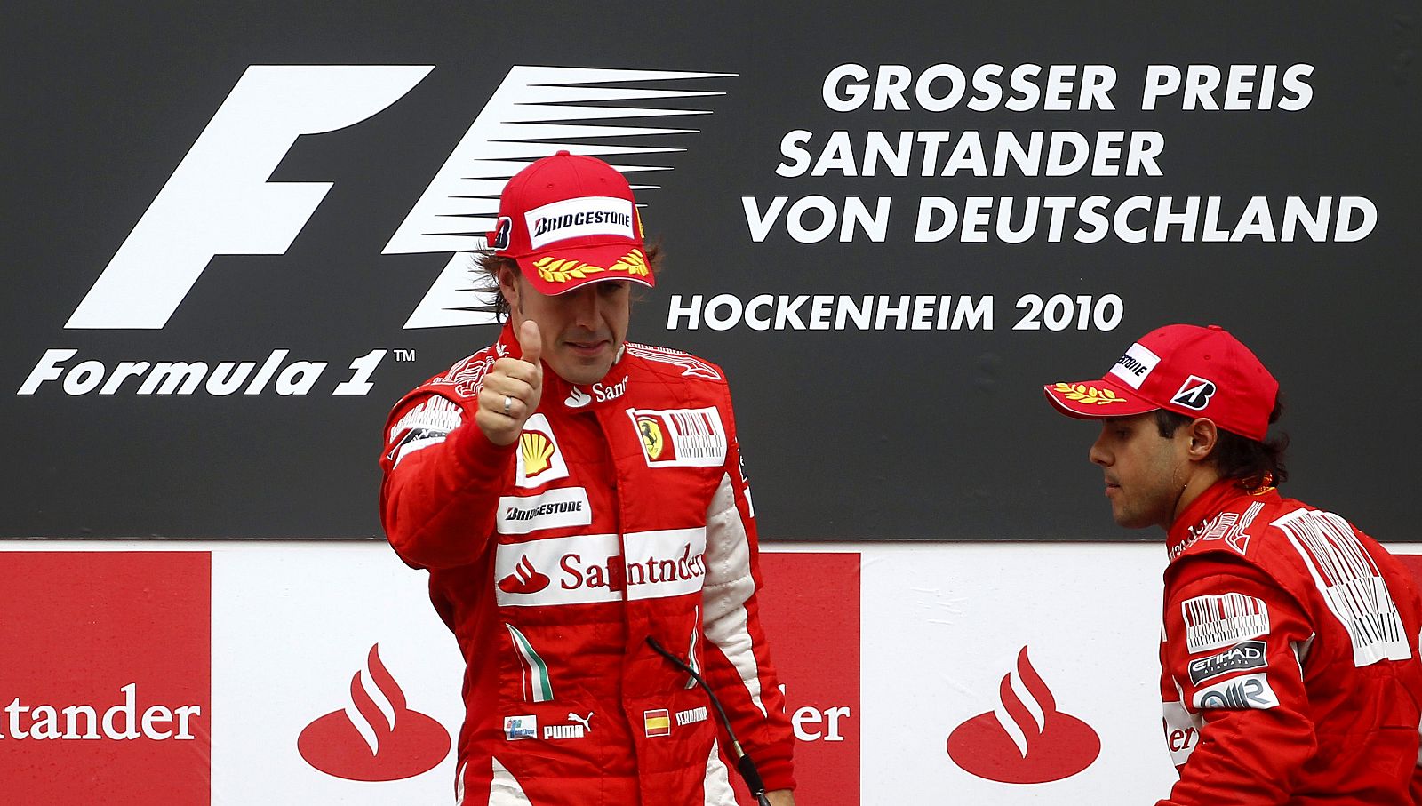 Fernando Alonso y Felipe Massa en el podio del GP de Alemania.
