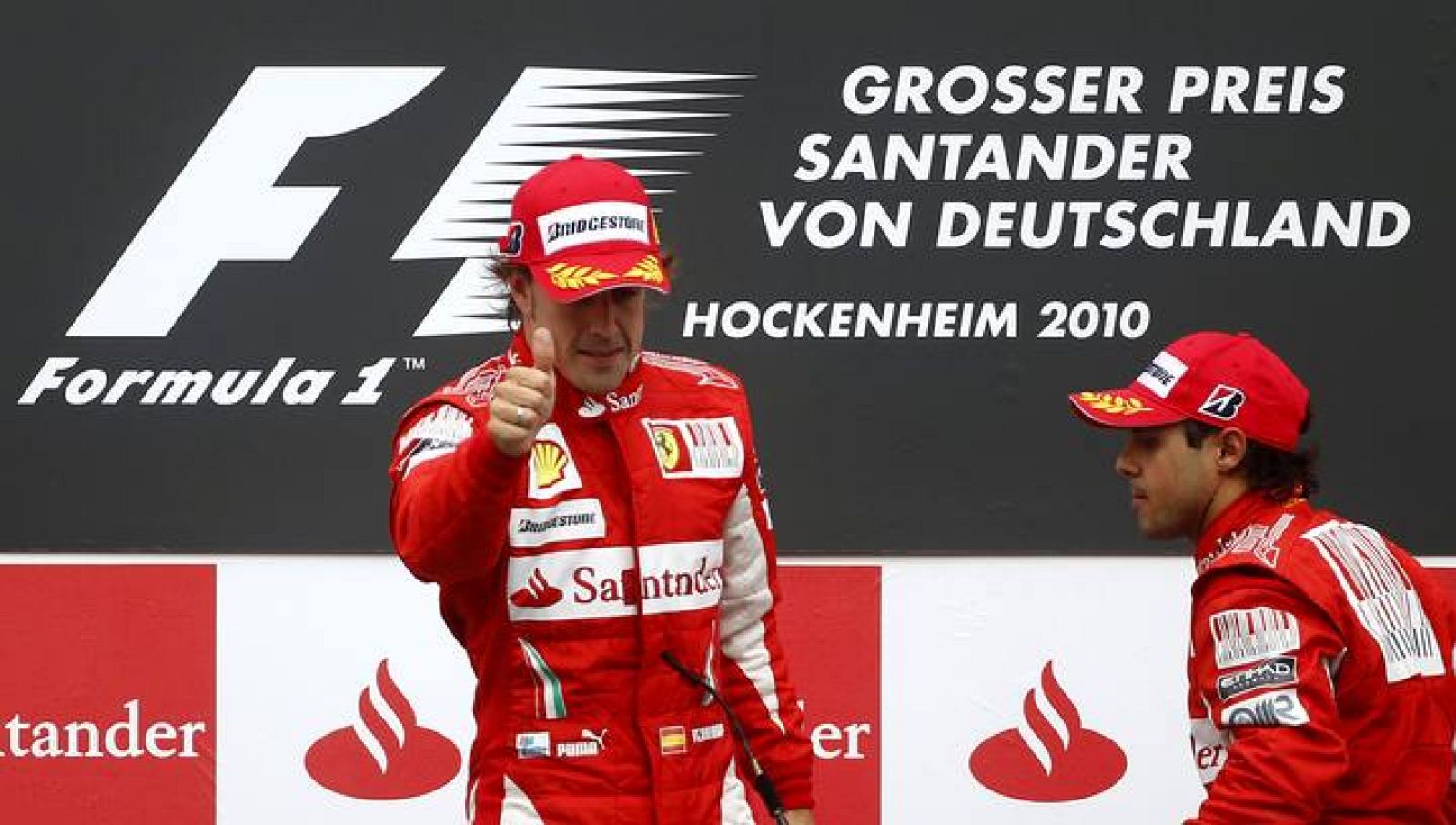Fernando Alonso y Felipe Massa en el podio del GP de Alemania.