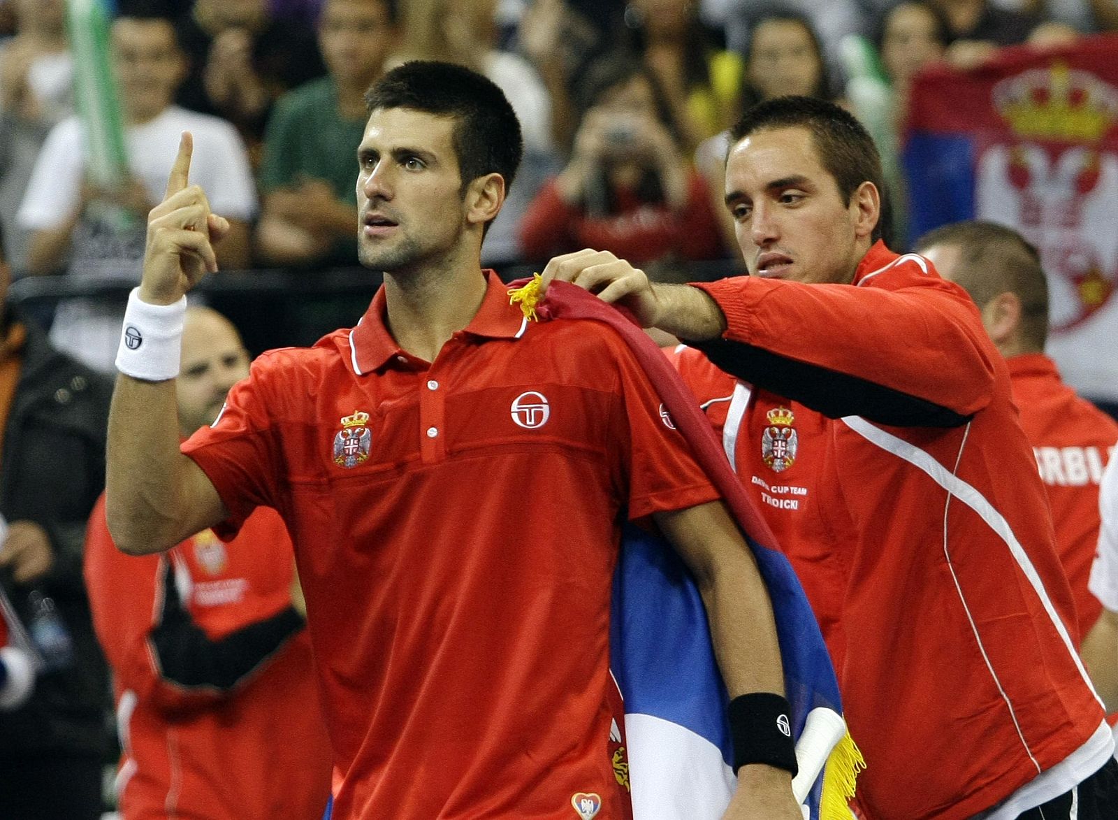 Djokovic celebra su victoria sobre Thomas Berdych