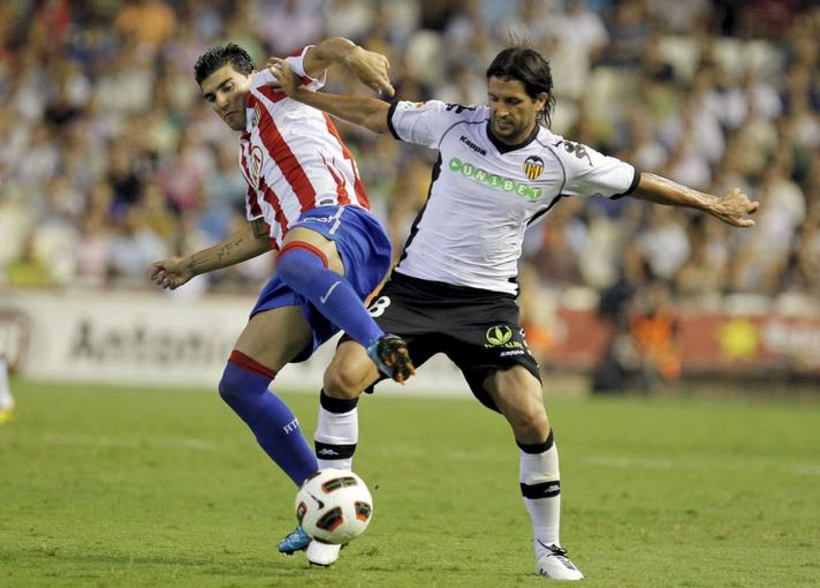 Valencia y Atlético empataron a un gol, aunque merecieron más los locales