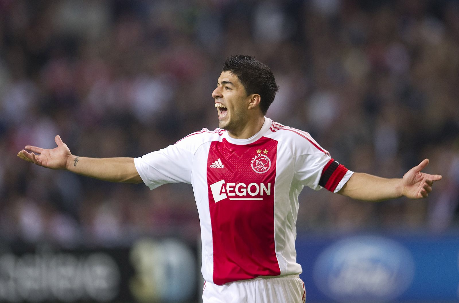 Ajax Amsterdam's Luis Suarez reacts against AC Milan during their Champions League Group G soccer match in Amsterdam