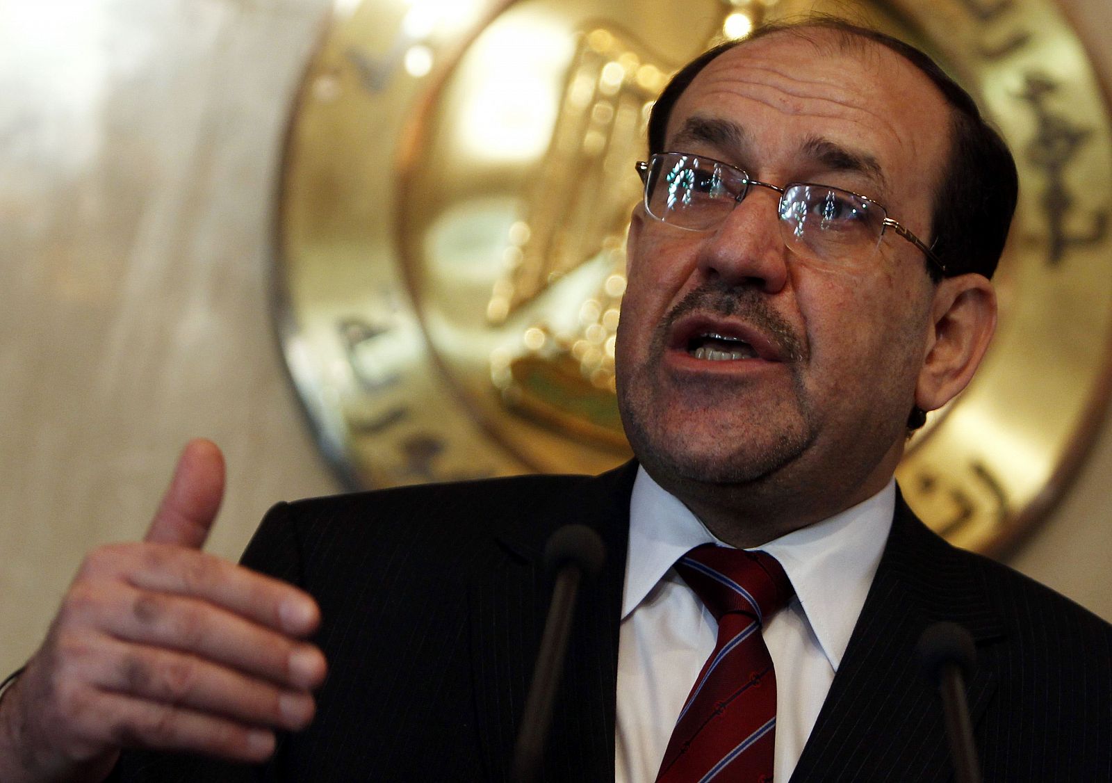Iraq's PM Maliki speaks during a news conference after meeting Egypt's President Mubarak at the presidential palace in Cairo