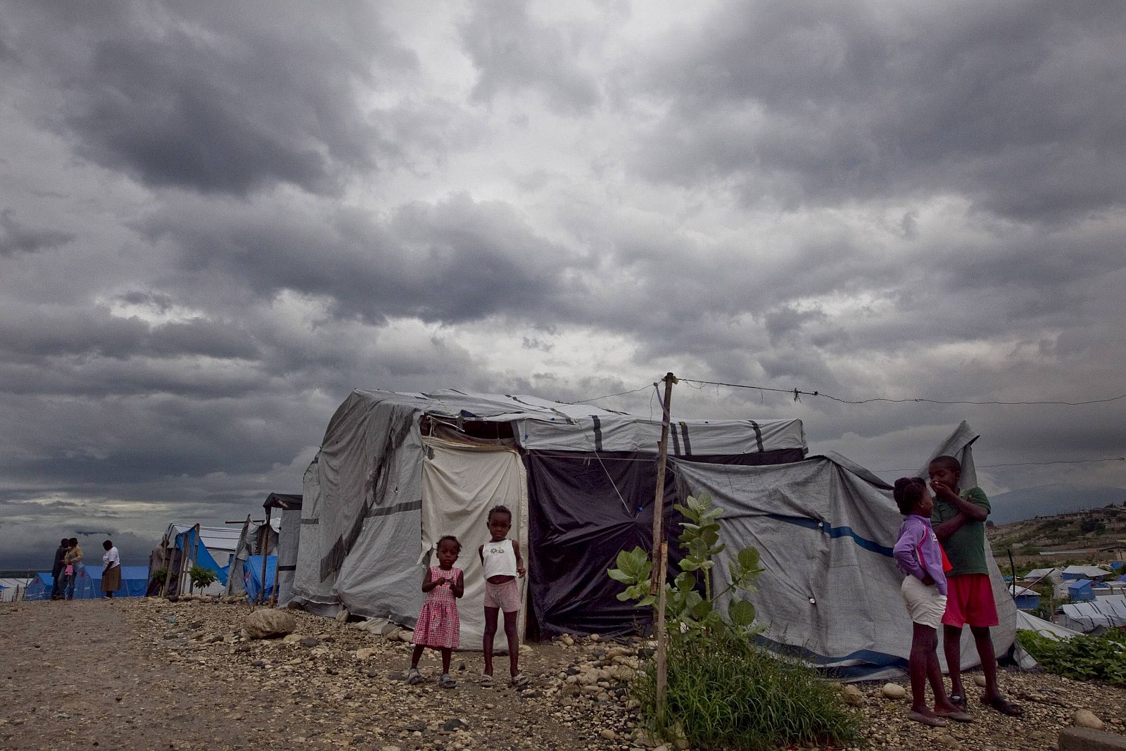 Residents of a camp for people displaced by the January earthquake are pictured in Port au Prince