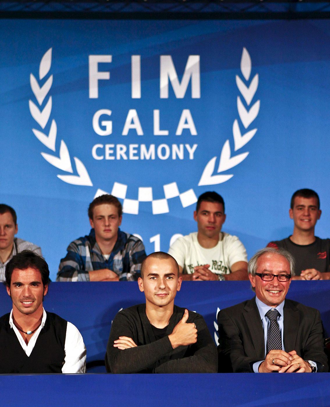 Toni Elías, Jorge Lorenzo y el presidente de la Federación Internacional de Motociclismo (FIM) Vito Ippolito.