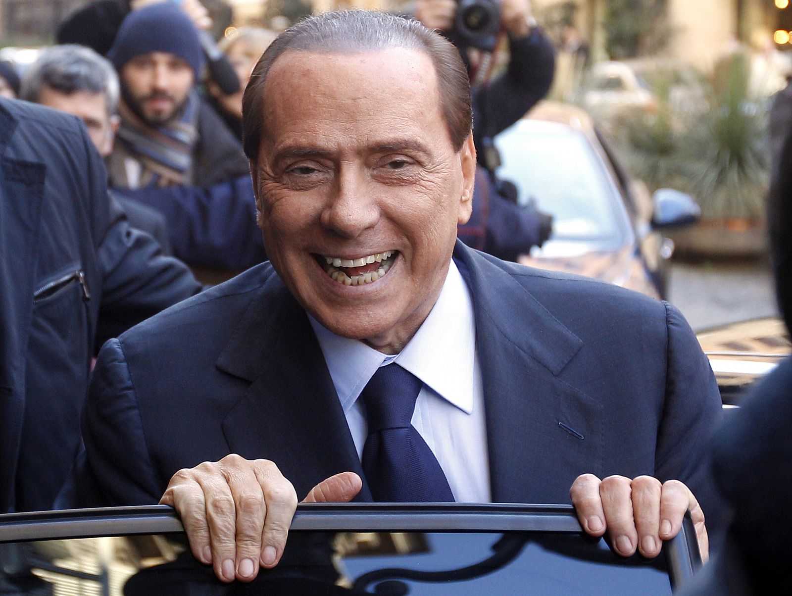 Berlusconi al abandonar el Senado el pasado martes
