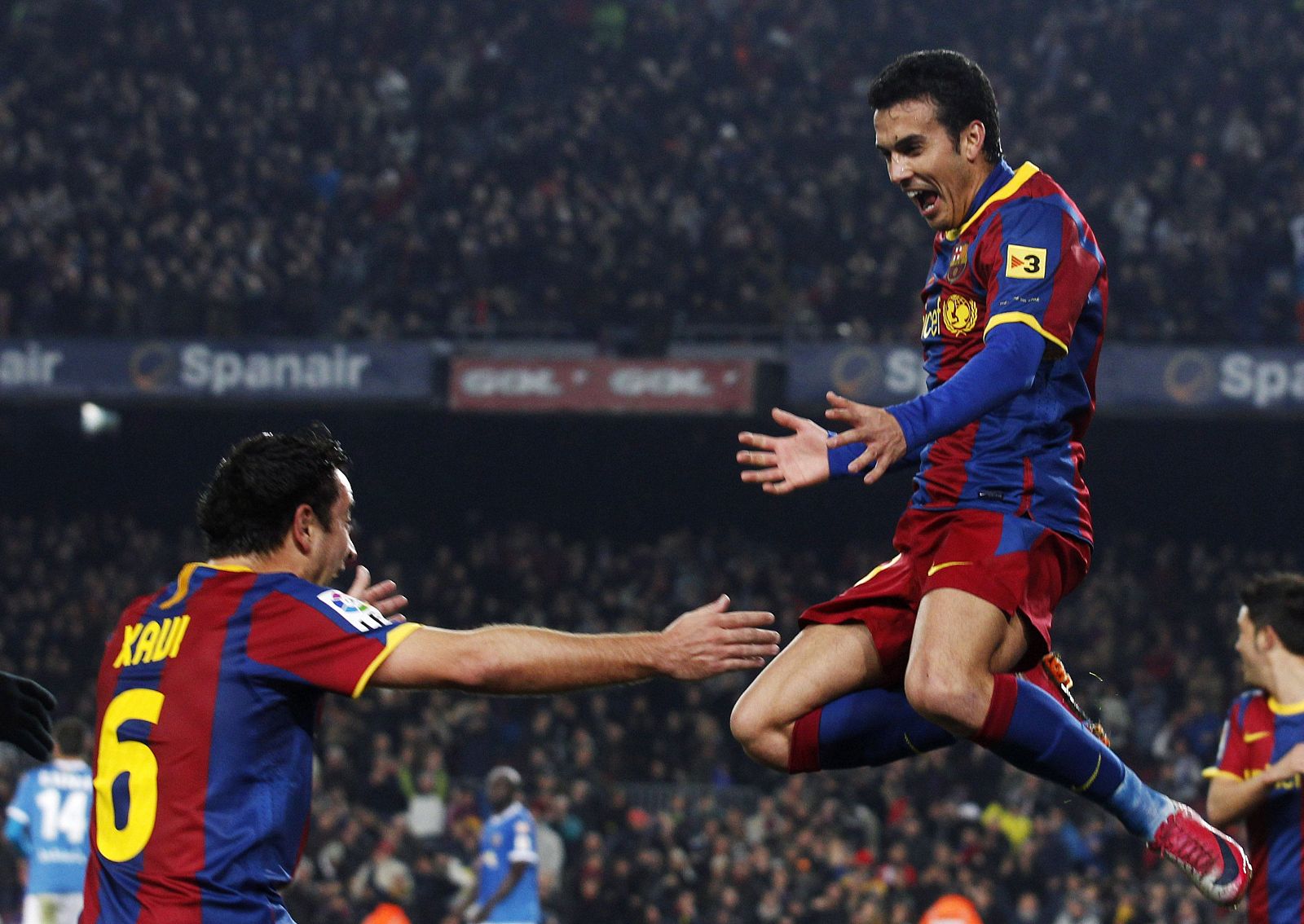 Barcelona's Rodriguez and Hernandez celebrate a goal against Almeria during their Spanish King's Cup semi-final soccer match in Barcelona