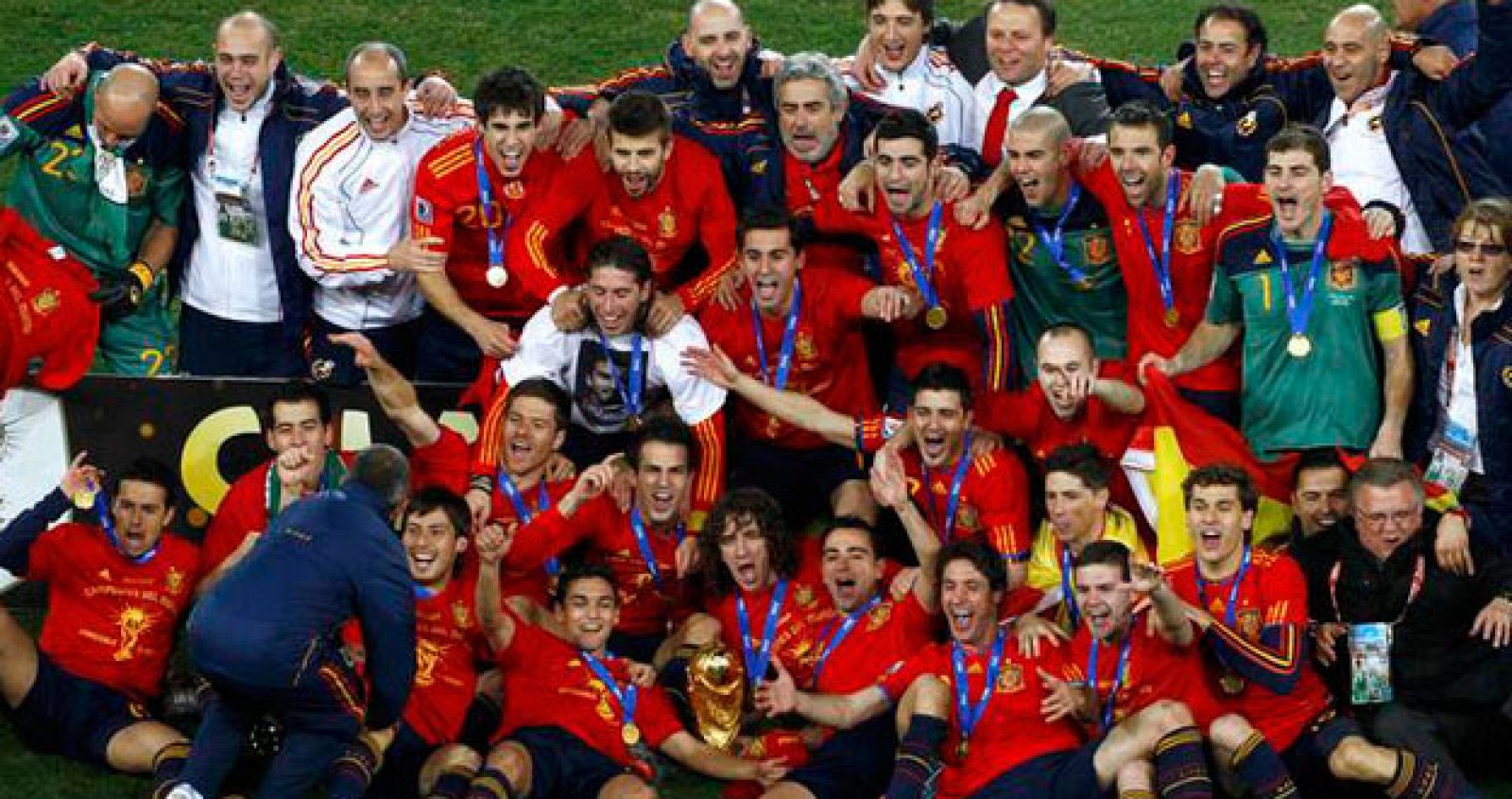 Spain's soccer team celebrates with World Cup trophy after their final match victory over Netherlands, during award ceremony at Soccer City stadium in Johannesburg