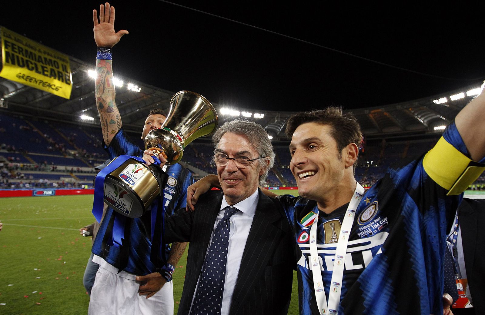 Inter Milan's Zanetti and Materazzi celebrate with Massimo Moratti after winning the Italian Cup final soccer match against Palermo in Rome