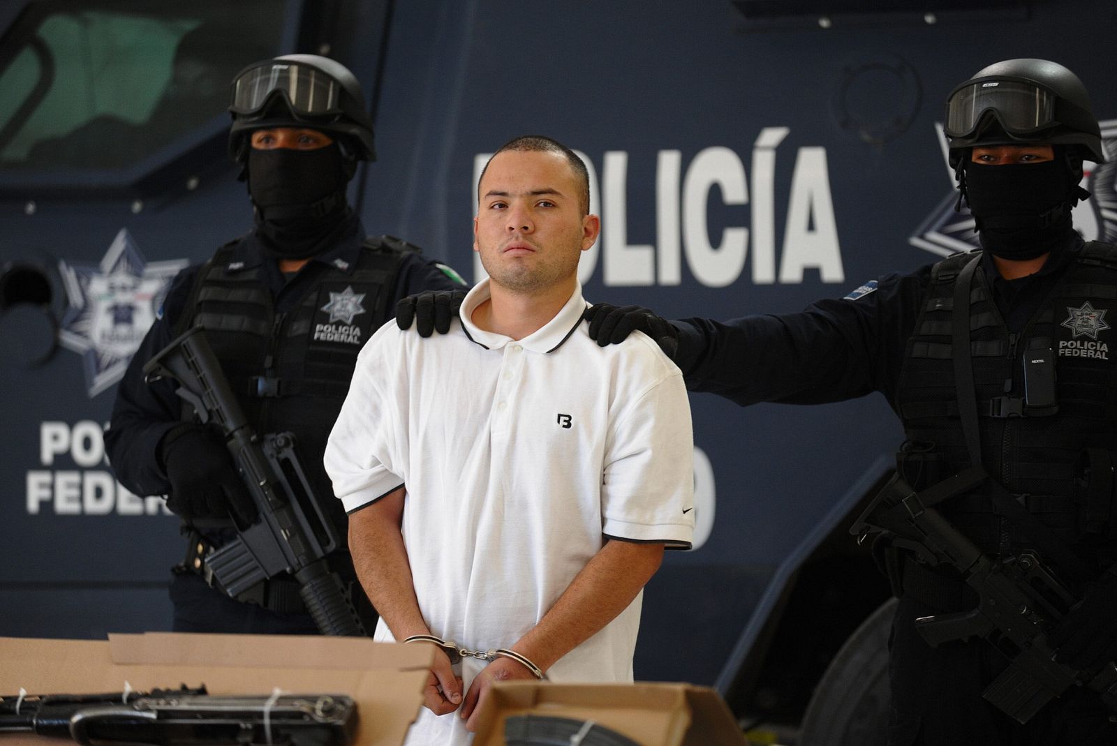 Edgar Huerta, escoltado por la Policía.