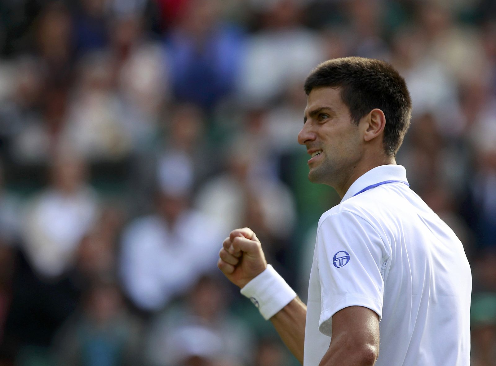 Djokovic celebra un punto en su partido contra Chardy