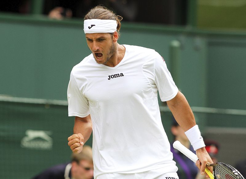 Feliciano López celebra un punto sobre el estadounidense Andy Roddick