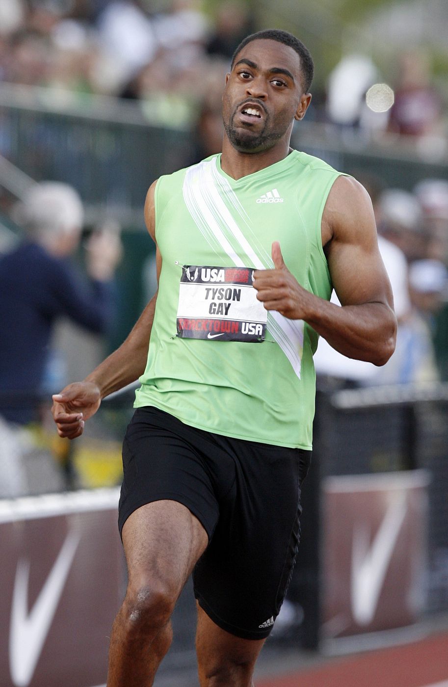Tyson Gay finishes the men's 100 meters heat at the U.S. Outdoor Track and Field Championships in Eugene