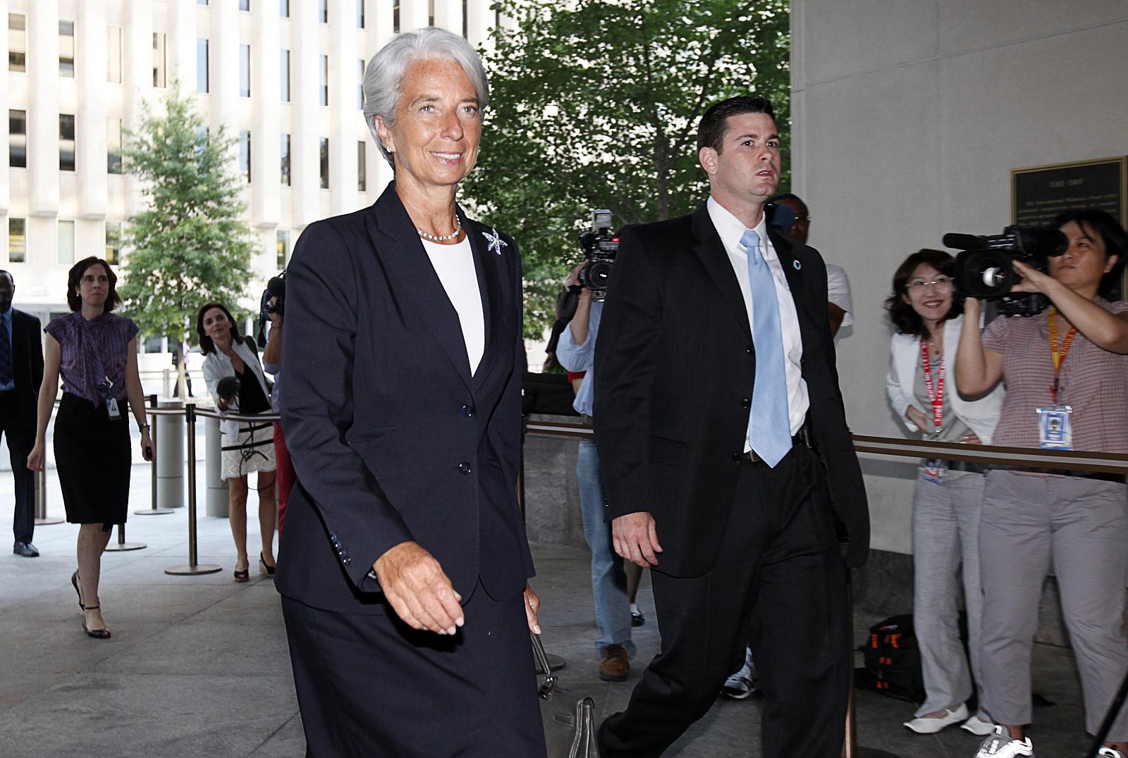 Former French Finance Minister Christine Lagarde arrives at the International Monetary Fund headquarters for her first day as head of the IMF in Washington