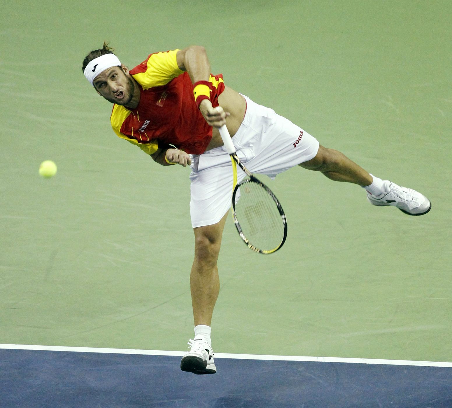 Lopez of Spain serves against Fish of the U.S. during their singles Davis Cup tennis match in Austin, Texas