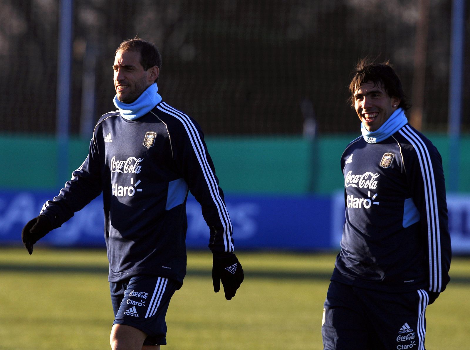 Argentina's national soccer team players Carlos Tevez and Pablo Zabaleta attends a training session in Buenos Aires