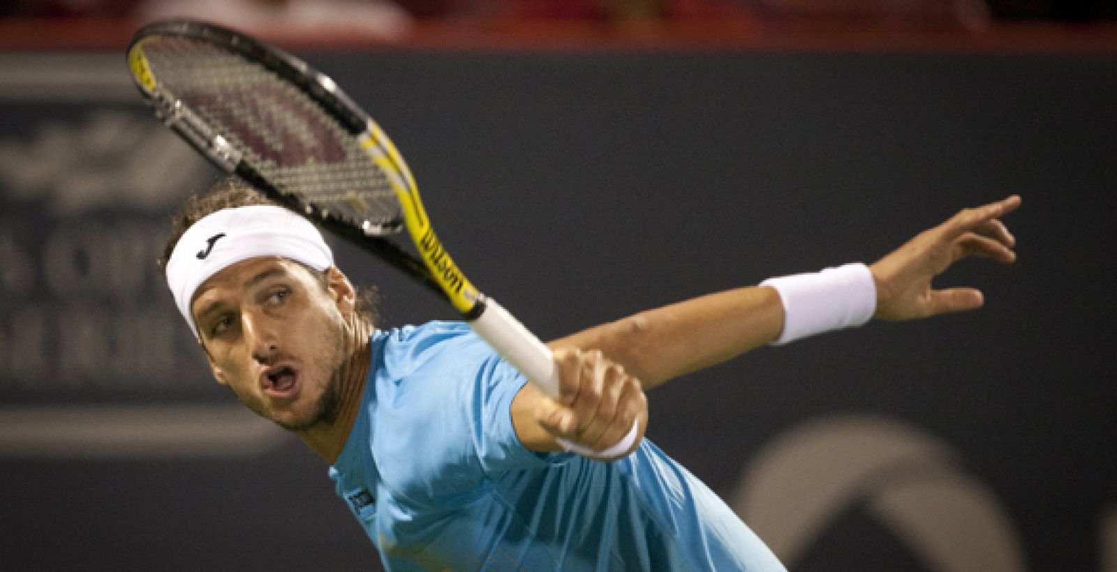 Feliciano López devuelve la pelota a Mardy Fish