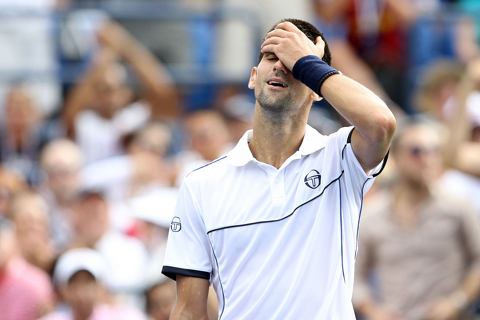 Novak Djokovic  ha sufrido para ganar a Alexandr Dolgopolov en el US Open 2011.