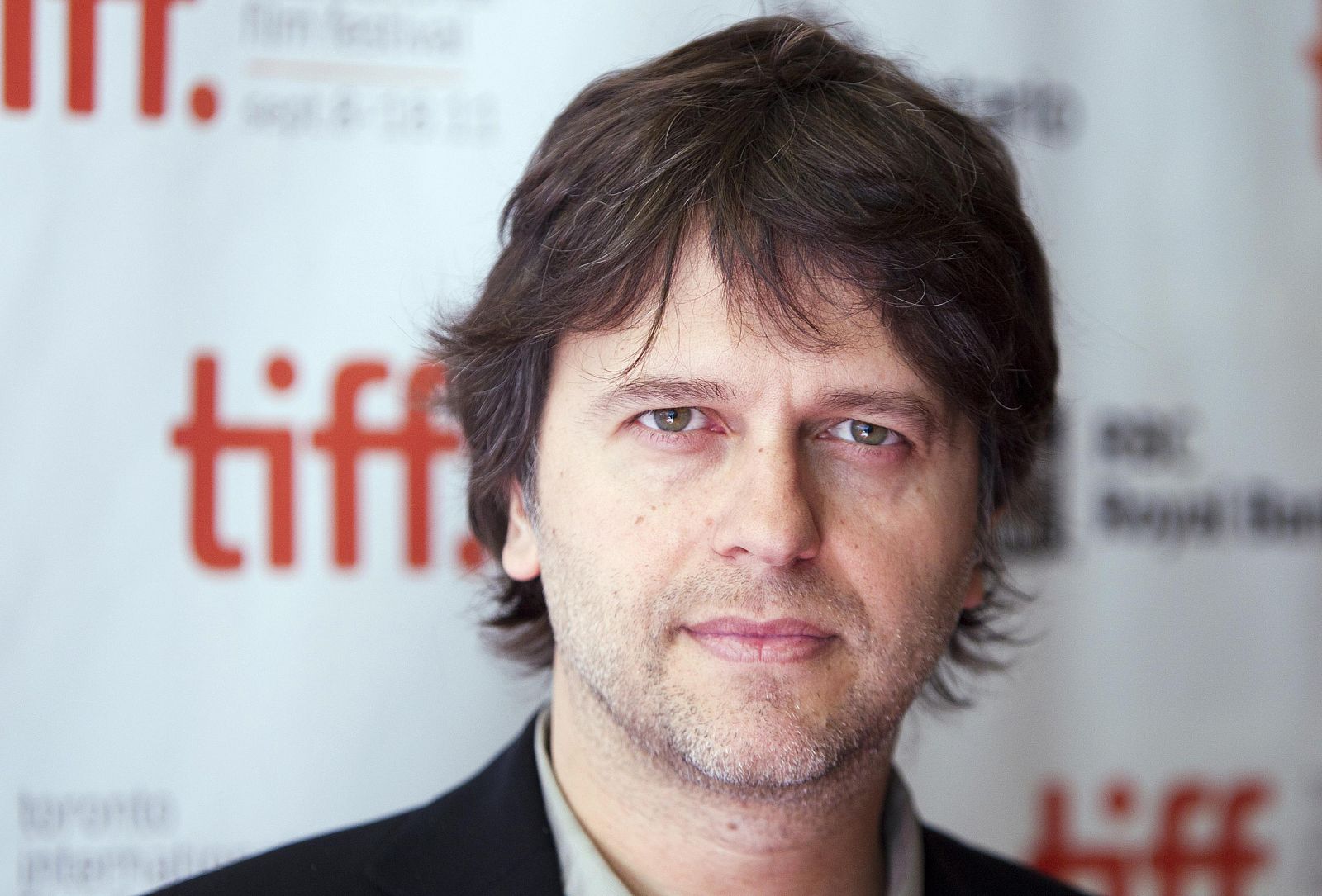 Spanish director Fresnadillo arrives on the red carpet for the film "Intruders" during the 36th Toronto International Film Festival