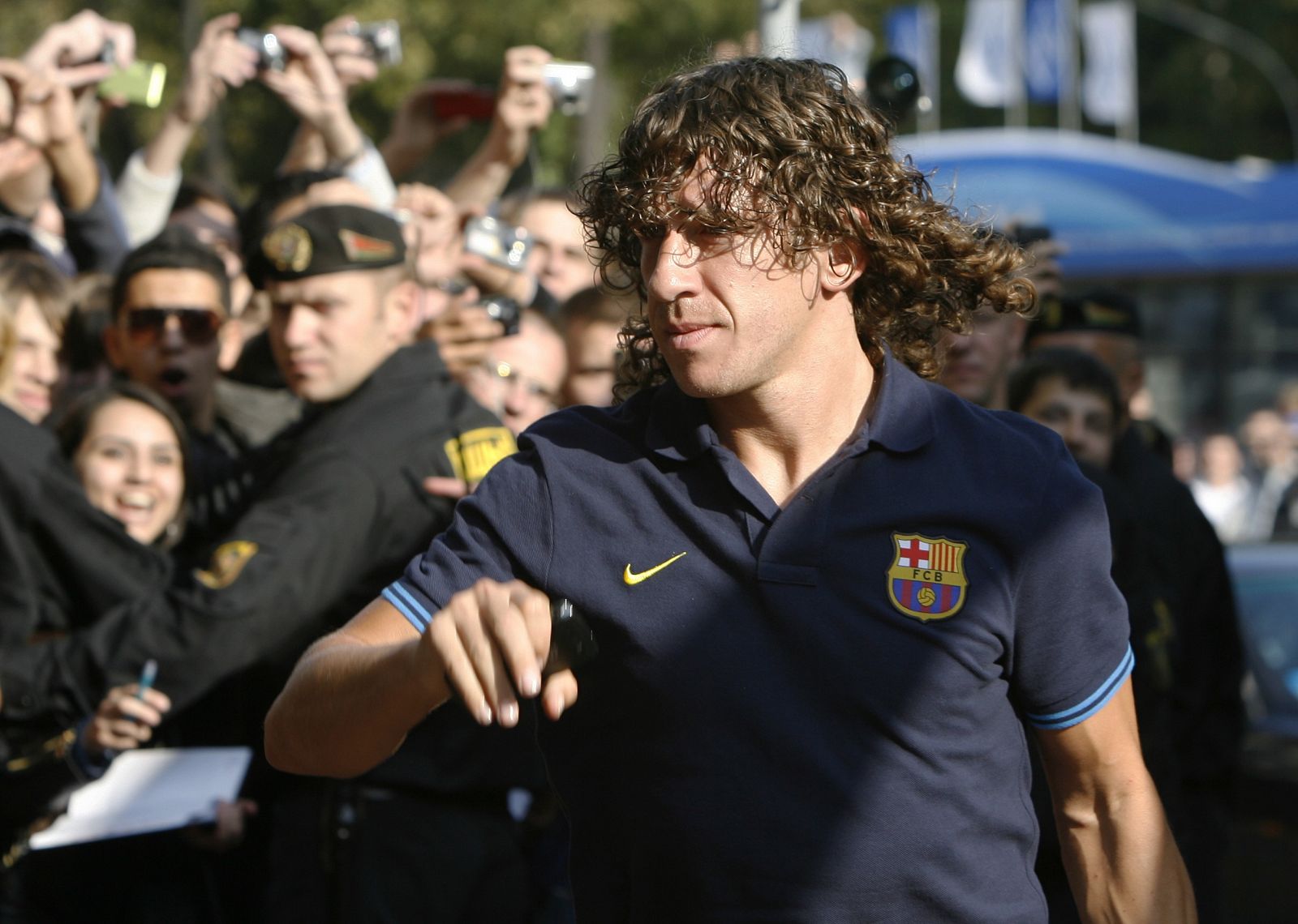 Barcelona's Carles Puyol arrives at the Crowne Plaza hotel in Minsk