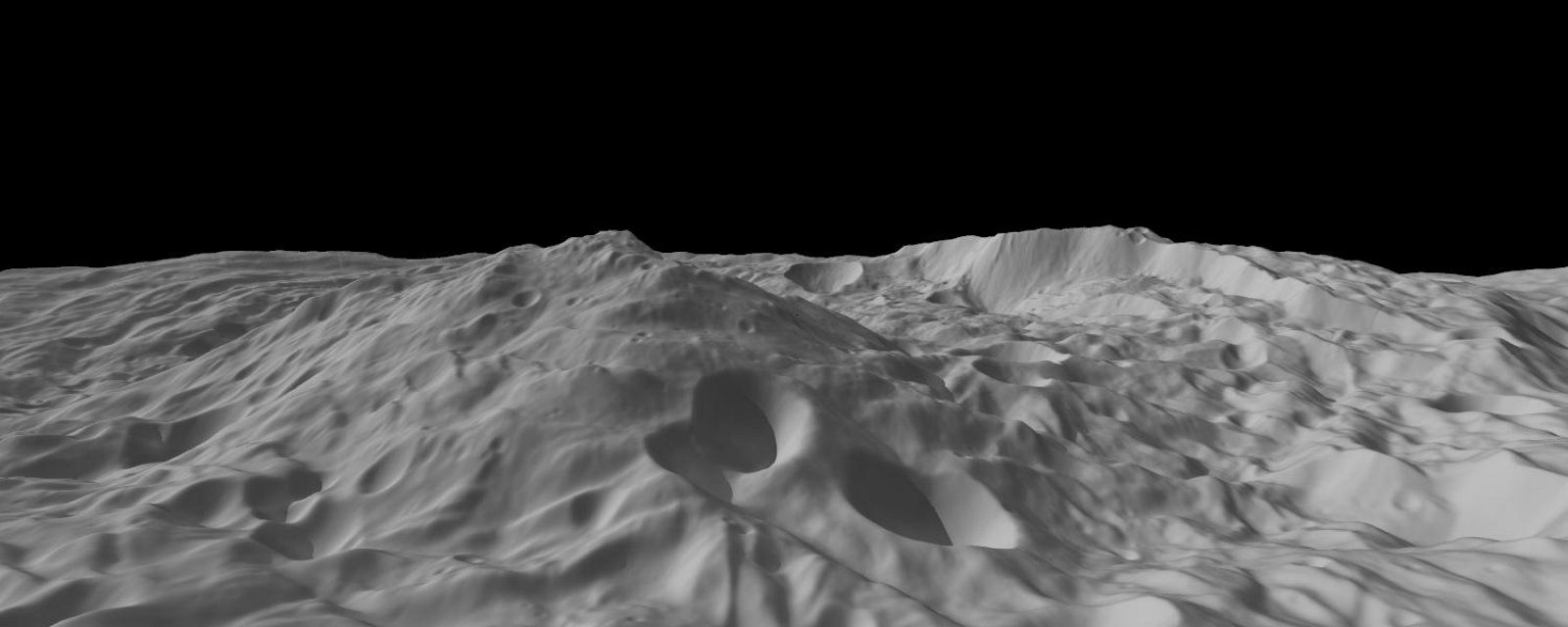 El pico en el asteroide Vesta, que se muestra en el centro de la imagen, se eleva 22 kilómetros por encima de la altura media del terreno