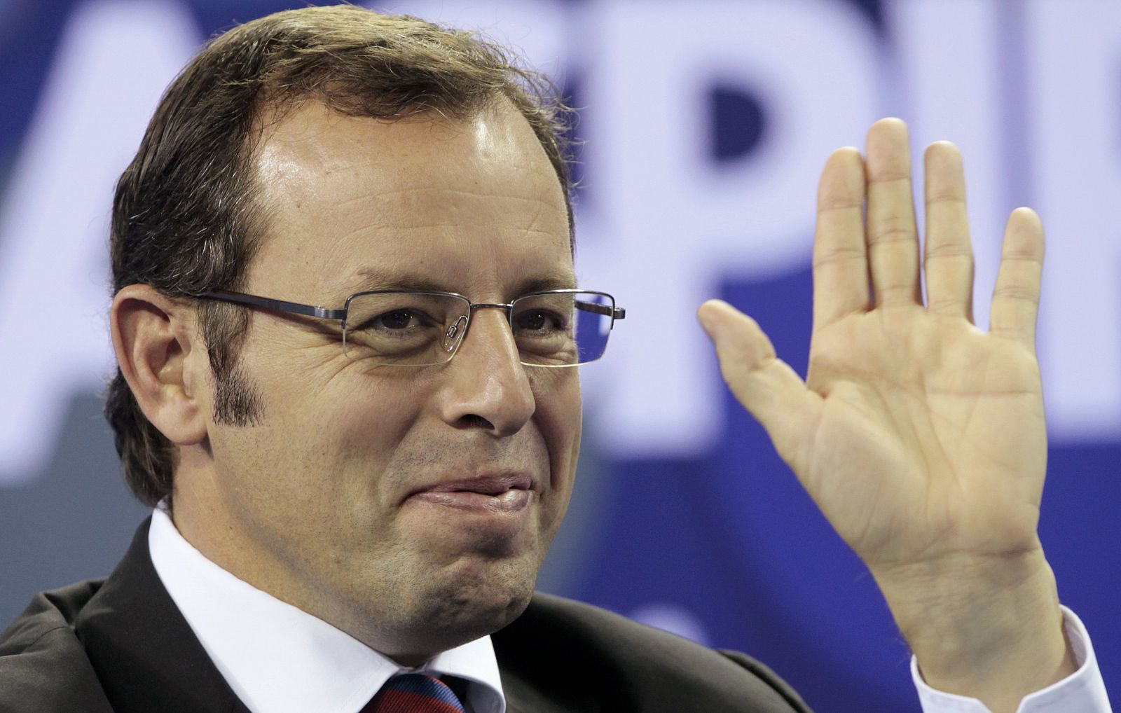 Barcelona's President Sandro Rosell attends a news conference at the Sports Congress and Exhibition at Aspire Dome in Doha