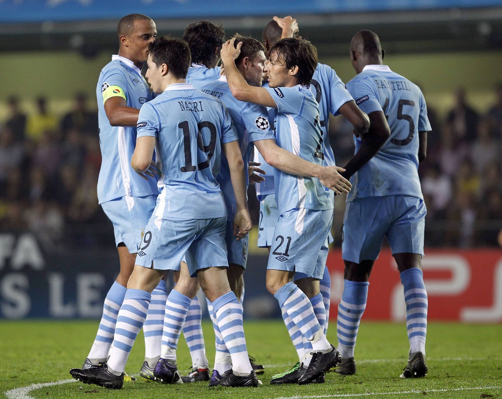 Manchester City players celebrate after Yaya Toure scored their first goal during their Champions League Group A soccer match against Villarreal at the Madrigal stadium in Villarreal