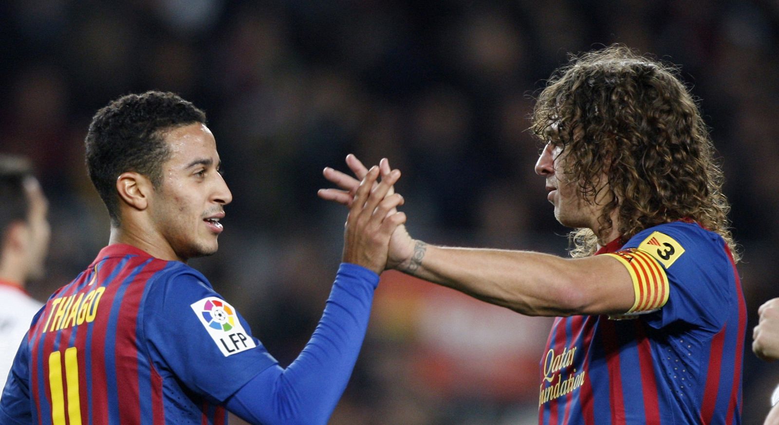 Thiago y Puyol, en el último partido de Copa contra L'Hospitalet.