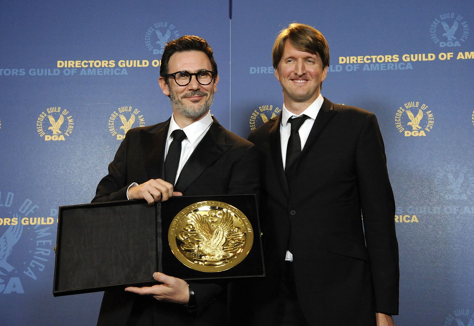 Tom Hooper poses with Feature Film Award recipient Michel Hazanavicius at the 64th annual Directors Guild of America Awards in Los Angeles