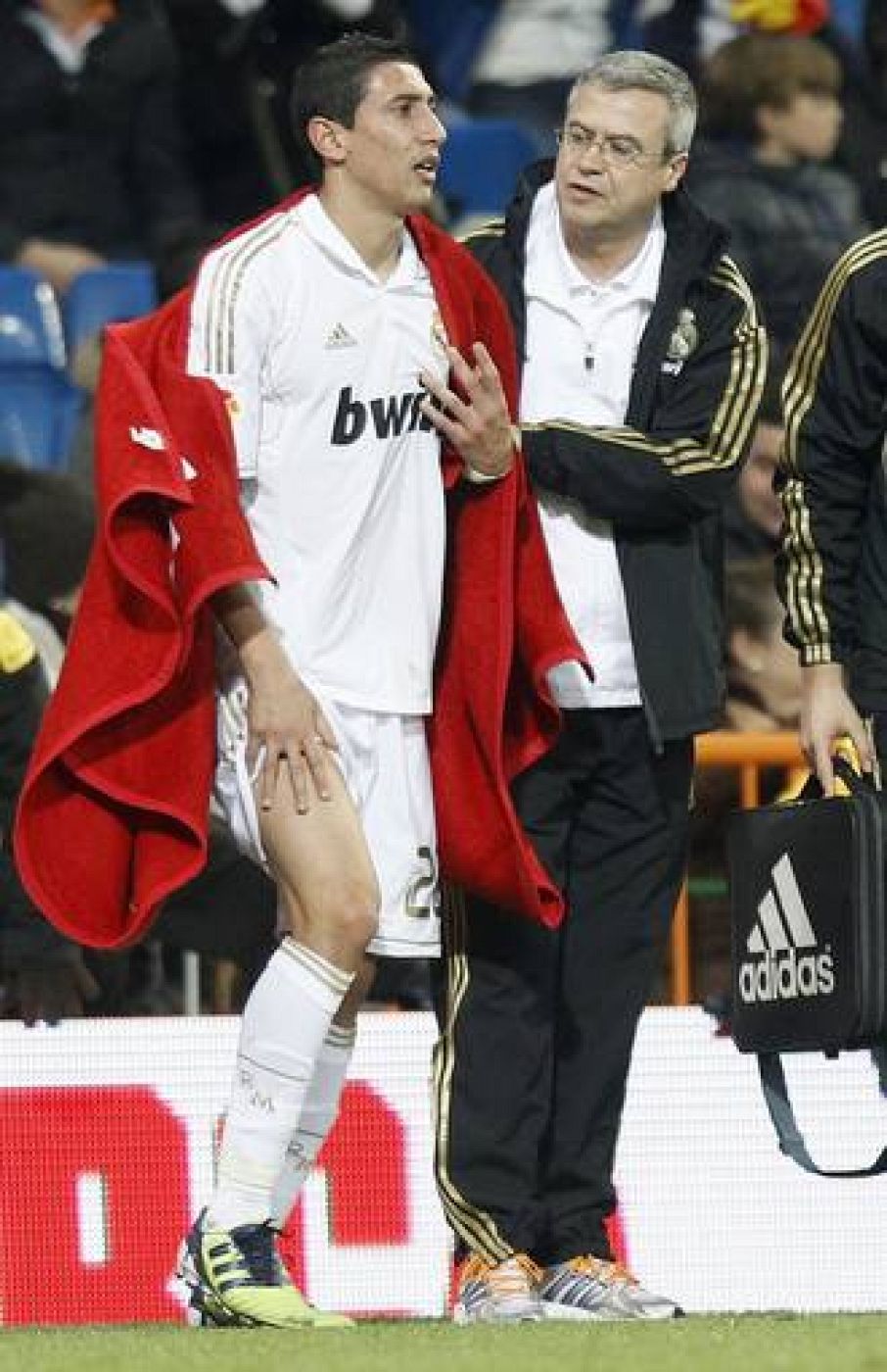 Real Madrid's Di Maria reacts after being injured during their Spanish First Division soccer match against Racing Santander in Madrid