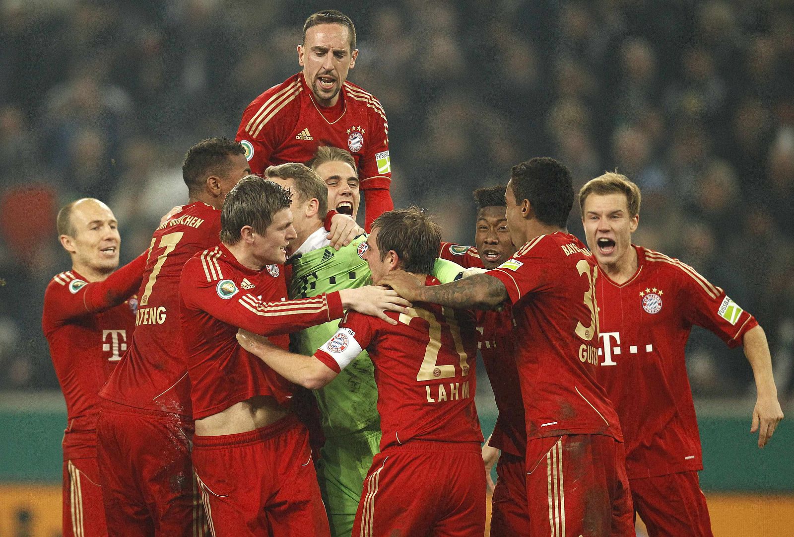 Manuel Neuer, goalkeeper of Bayern Munich reacts after saving the decisive penalty of their German soccer cup (DFB-Pokal) semi-final against Borussia Moenchengladbach in Moenchengladbach