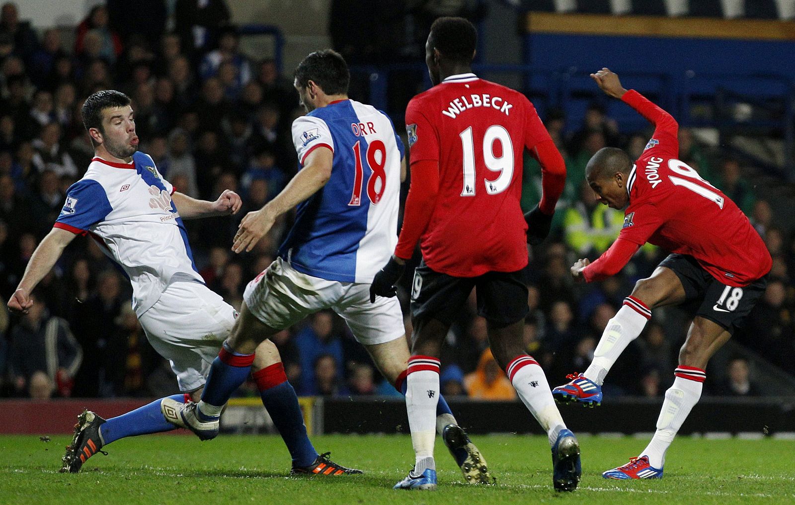 Manchester United's Young scores against Blackburn Rovers during their English Premier League soccer match in Blackburn