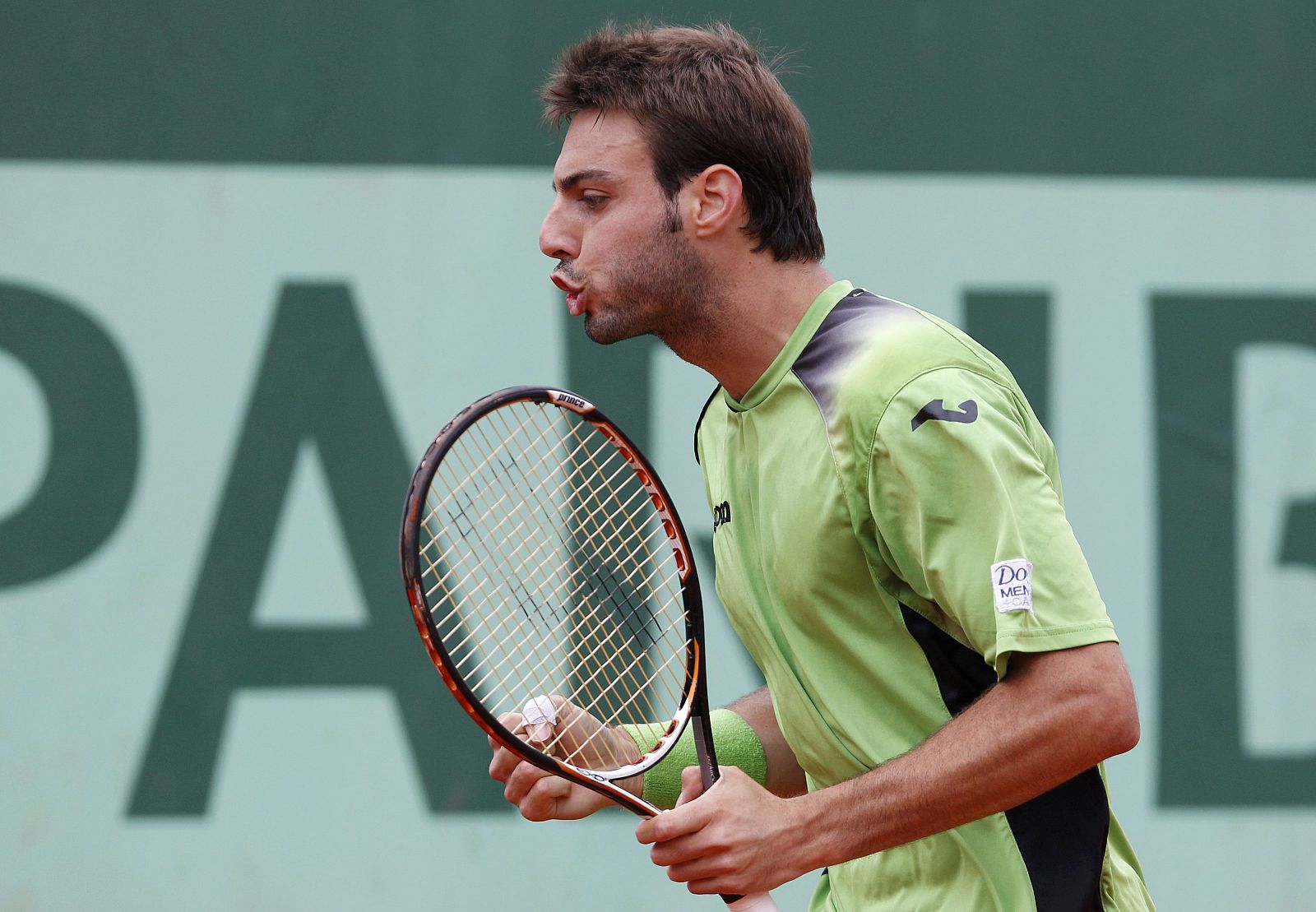 Marcel Granollers celebra un punto en su partido frente a Malek Jaziri