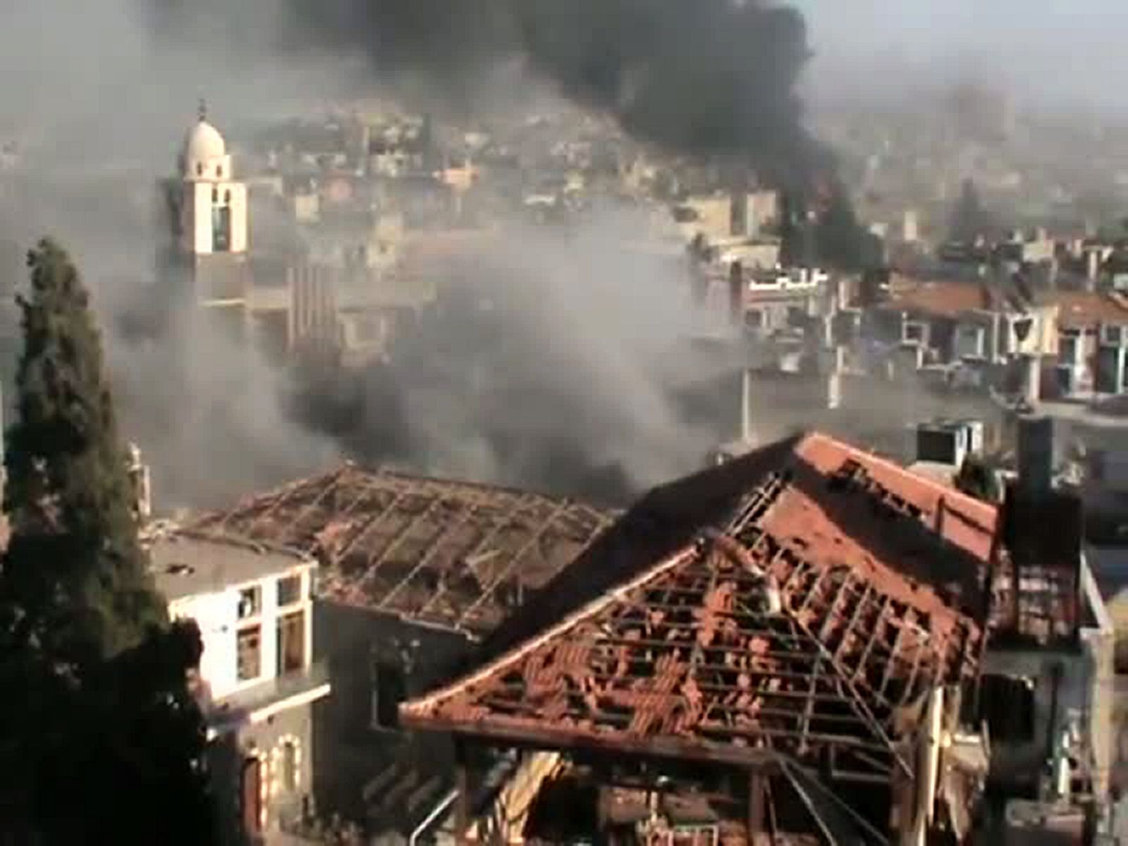 Imágen de videoaficionado conlgadas en YouTube con la que la oposición denuncia bombardeos del régimen sirio sobre Homs. Estas imágenes no han podido ser contrastadas por fuentes independientes