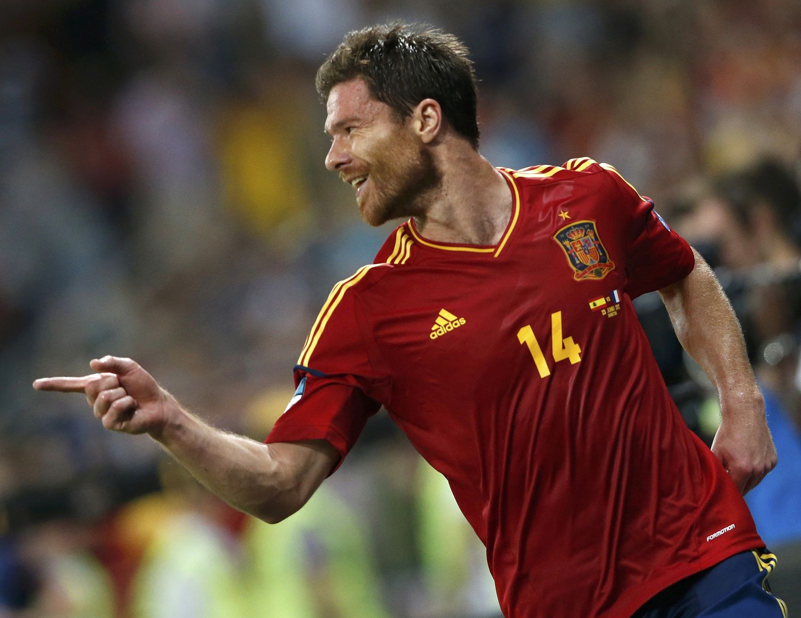 Spain's Alonso celebrates after scoring a gaol against France during their Euro 2012 quarter-final soccer match at Donbass Arena in Donetsk