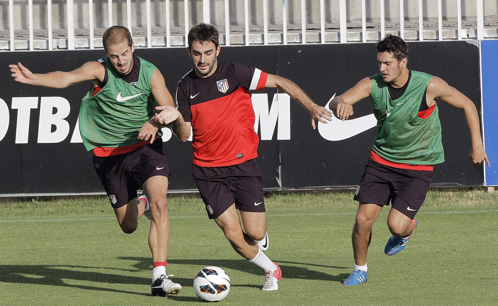 Koke Resurrección, a la derecha, disputa un balón durante un entrenamiento del Atletico de Madrid.