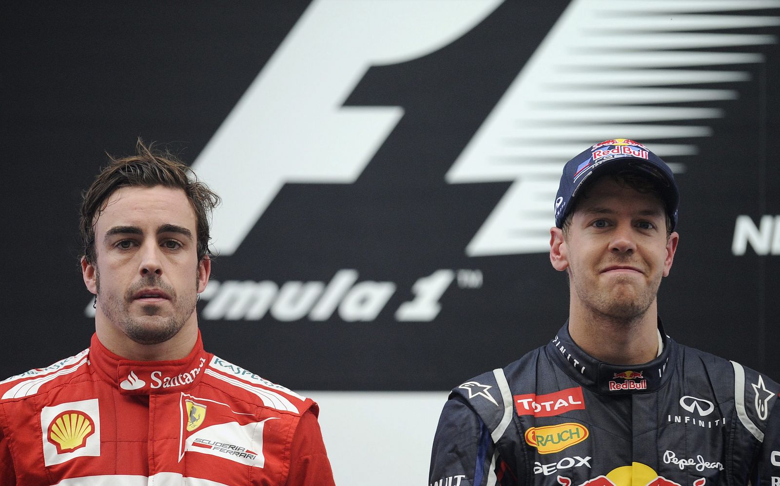 Fernando Alonso y Sebastian Vettel, en el podio del pasado GP de la India