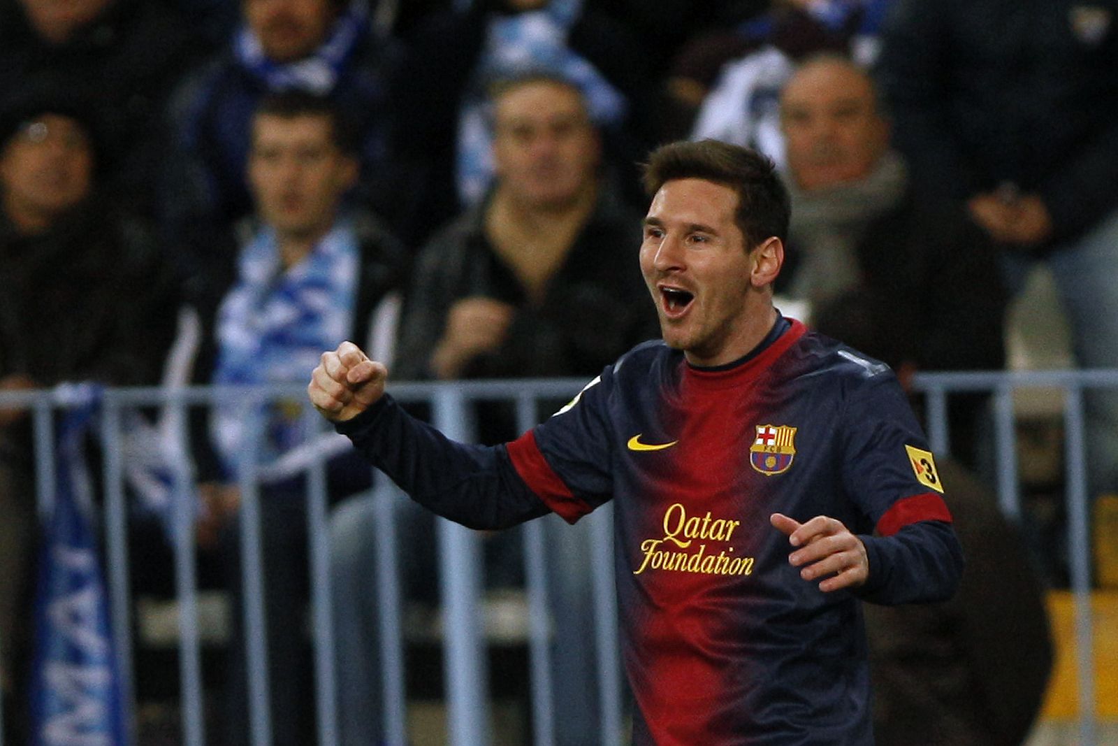 Barcelona's Messi celebrates after scoring a goal against Malaga during their Spanish First Division soccer match in Malaga