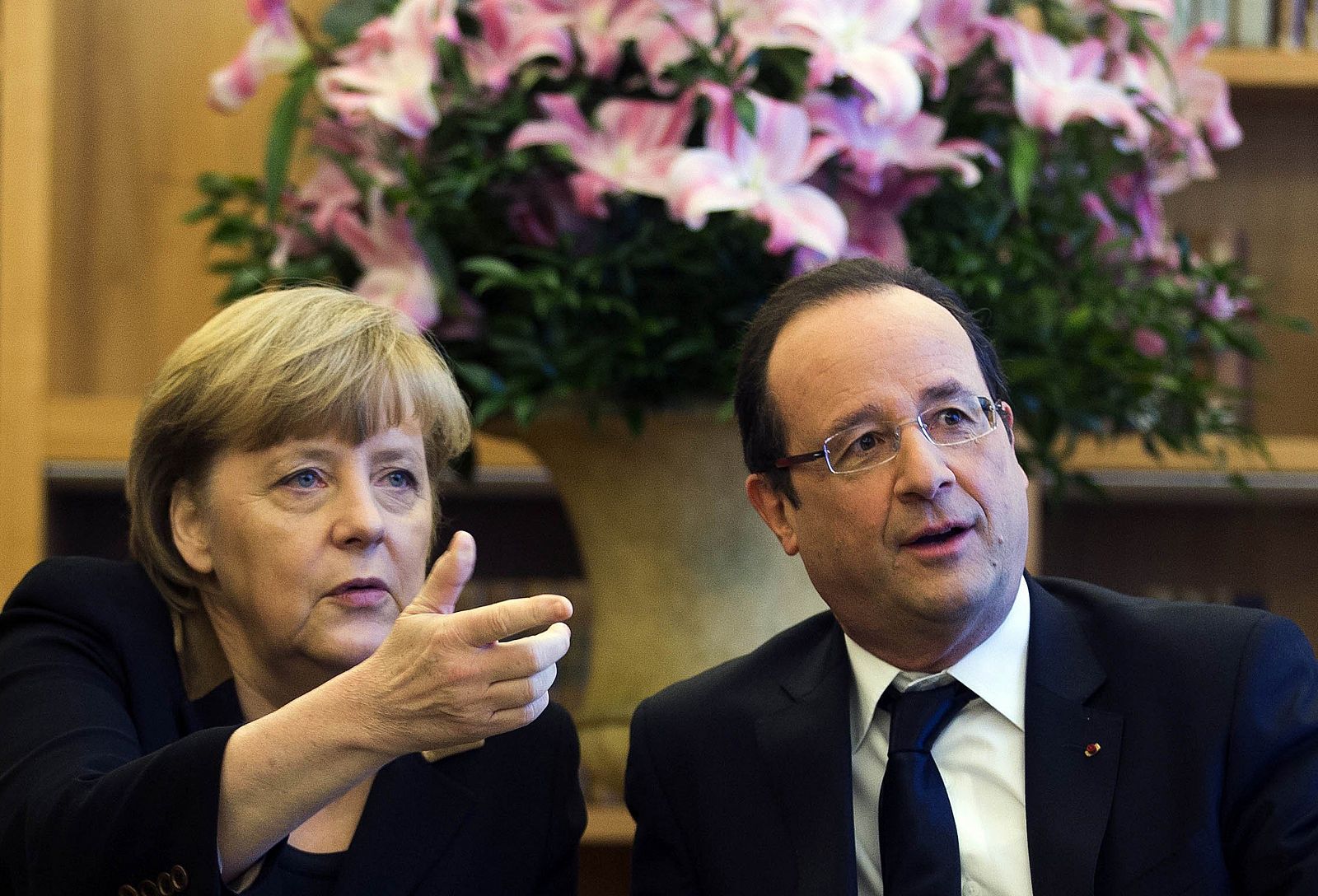 Angela Merkel y François Hollande durante las celebraciones del 50º aniversario del Tratado del Elíseo