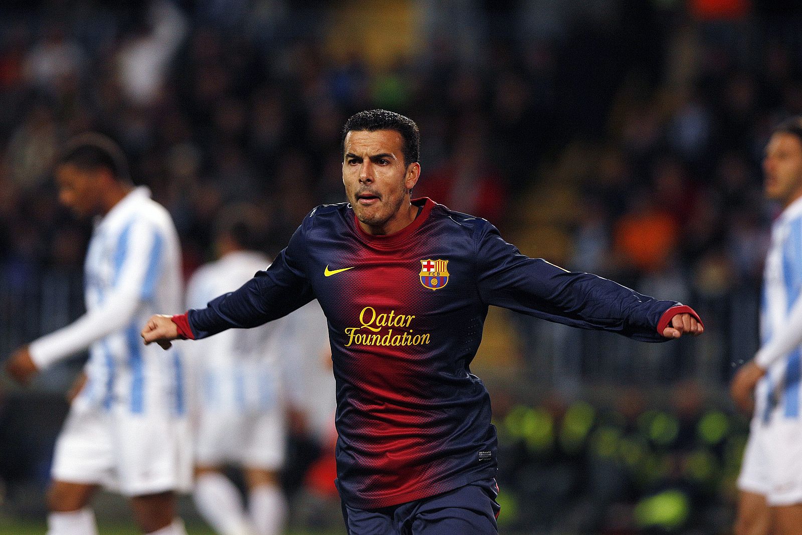 El barcelonista Pedro Rodriguez celebra uno de los goles de su equipo contra el Málaga