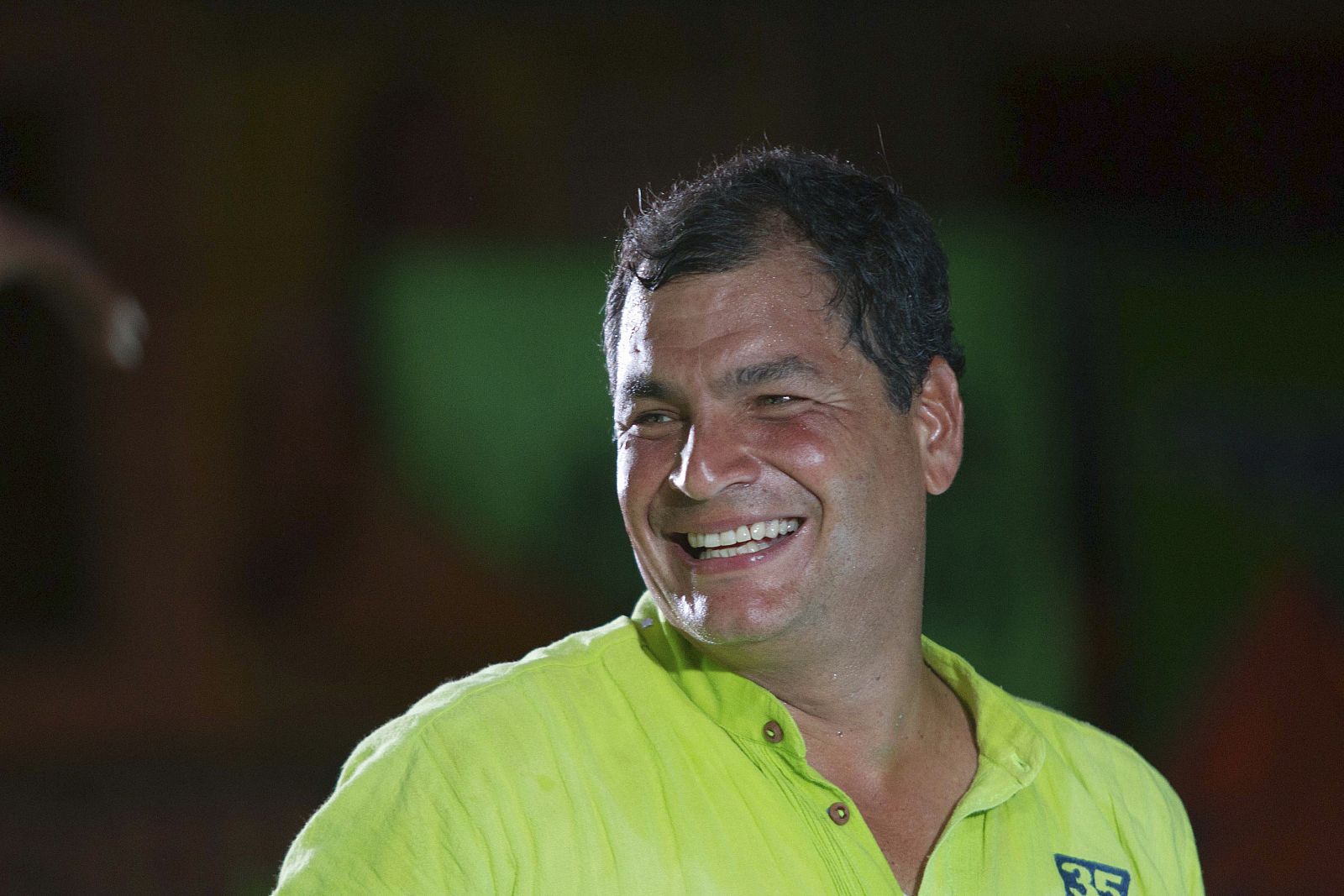 Ecuador's President Correa smiles during his closing political rally in Guayaquil