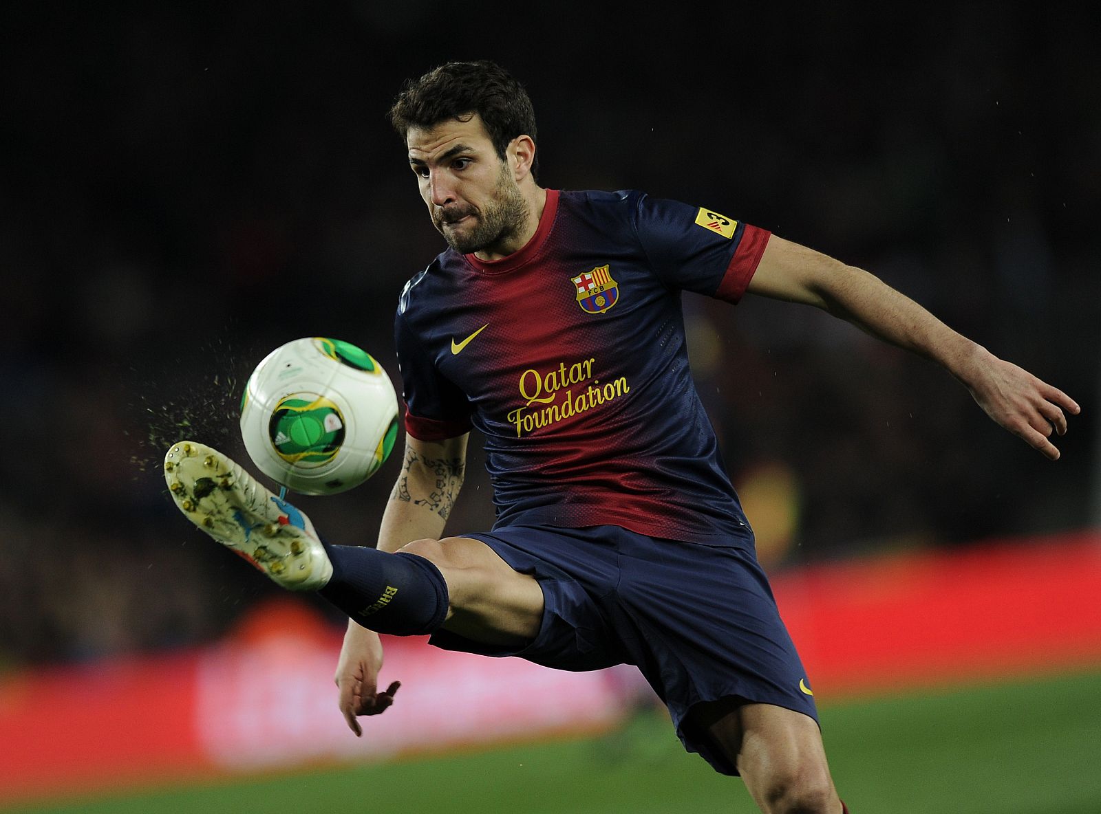 Cesc Fábregas, en un partido con el Barça.