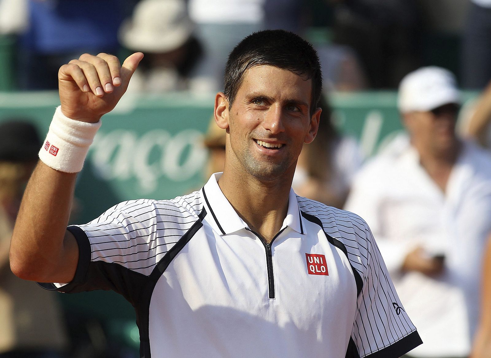 El tenista serbio Novak Djokovic celebra su victoria